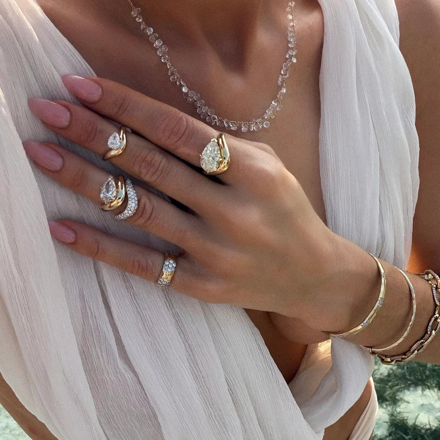 Floating Pear Diamond Ring